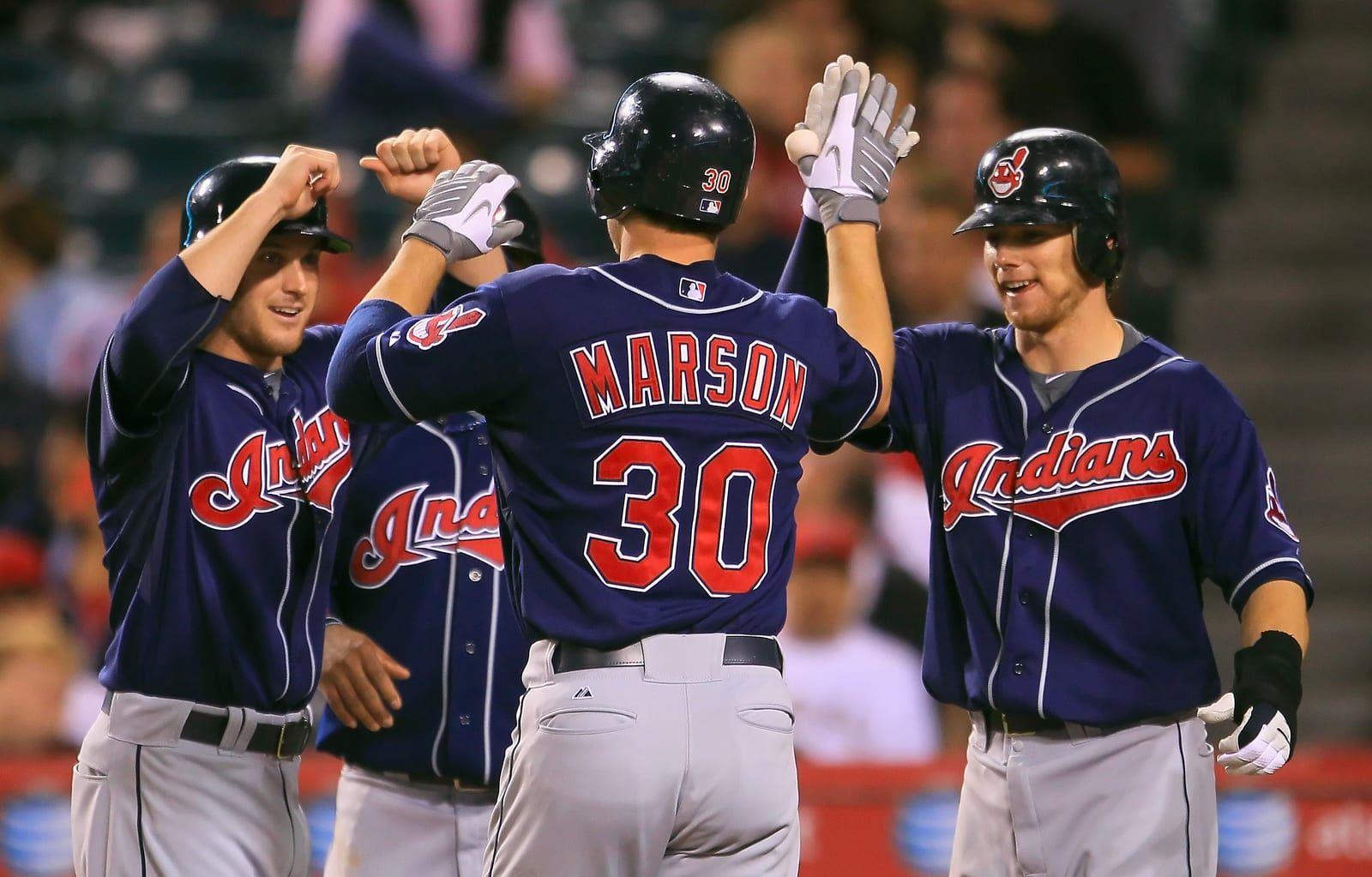 Lou Marson giving a high five for not striking out